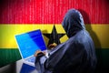 Anonymous hooded hacker, flag of Ghana, binary code - cyber attack concept Royalty Free Stock Photo