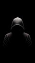 anonymous hooded hacker hiding face in dark shadow, cybercrime and mystery concept