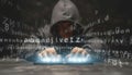 Anonymous Hooded Hacker Typing on Glowing Keyboard - Cybersecurity and Data Breach Concept Royalty Free Stock Photo