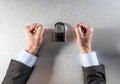 Anonymous impatient businessman hands fighting for corporate data security
