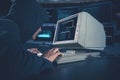 Anonymous man hacking data information on system