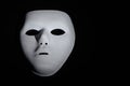 Anonymous mask isolated on a black background Royalty Free Stock Photo