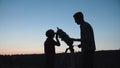 Man and boy using telescope Royalty Free Stock Photo