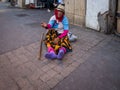 Anonymous poor beggar in the street