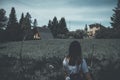 Anonymous woman walking in countryside