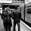 Anonymous Women And Men Passengers Leaving Or Disembarking A South Western Railway Train Royalty Free Stock Photo