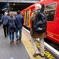 Anonymous Women And Men Passengers Leaving Or Disembarking A South Western Railway Train Royalty Free Stock Photo