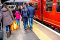 Anonymous Women And Men Passengers Leaving Or Disembarking A South Western Railway Train Royalty Free Stock Photo