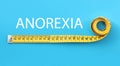 Anorexia concept. Yellow measuring tape on light blue background, top view