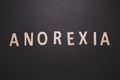 Anorexia word written on wood letters. anorexia text on table, concept