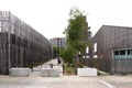 Another alley with vegetation in the city center between building and school. Royalty Free Stock Photo