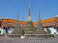 Wat Pho Thai Massage School Service Center. Another attraction of Wat Pho. Chinese stone statues adorned by arches and places.