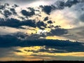 Another beautiful skyline with sunlight behind clouds. Royalty Free Stock Photo