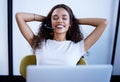 Another day, another big deal. a young call centre agent taking a break while working in an office. Royalty Free Stock Photo