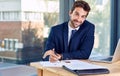 Another deal...signed. Portrait of a businessman working on paperwork. Royalty Free Stock Photo