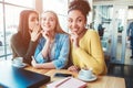 Another picture of three girls gossiping about something. One of them is trying to tell what she is thinking about the Royalty Free Stock Photo