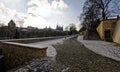 Another shot of stone laid road is partailly cleared off snow Royalty Free Stock Photo