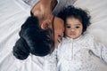 Another smooch attack. a young mother bonding with her baby girl in bed at home.