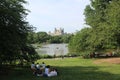 Another view of dakota building in New York from The Lake in Central Park Royalty Free Stock Photo