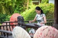 Woman playing Guzheng traditional chinese music instrument Royalty Free Stock Photo
