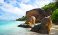 Anse Source d`Argent beach with big granite rocks in sunny day. La Digue Island, Indian Ocean, Seychelles. Royalty Free Stock Photo