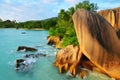 Anse Source d`Argent beach with big granite rocks at sunset. La Digue Island, Indian Ocean, Seychelles. Royalty Free Stock Photo