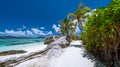 Anse Source d`Argent. Exotic tropical paradise beach on island La Digue in Seychelles. Blue ocean and sky, palm trees Royalty Free Stock Photo