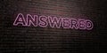 ANSWERED -Realistic Neon Sign on Brick Wall background - 3D rendered royalty free stock image