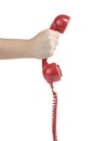 Answering an old fashioned red telephone Royalty Free Stock Photo