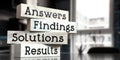 Answers, findings, solutions, results - words on wooden blocks