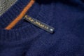 Close-up shot of Nudie Jeans brand tag or label in garment Royalty Free Stock Photo