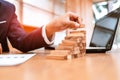 Ant eye view Male hand stacking wooden blocks. Business development and growth concept Royalty Free Stock Photo