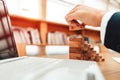 Ant eye view Male hand stacking wooden blocks. Business development and growth concept Royalty Free Stock Photo