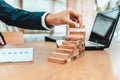 Ant eye view Male hand stacking wooden blocks. Business development and growth concept Royalty Free Stock Photo