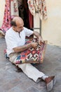 Turkish carpet master repearing old traditional turkish carpet