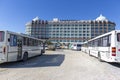 Buses from Dreamworld hotel stands in front of Dreamworld hotel in Turkey