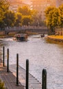 Antalya, Turkey - July 5, 2022: Touristic boat and gondola on the Porsuk River passing through the city center of Eskisehir