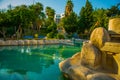 ANTALYA, TURKEY: Landscape with a view of a beautiful park with a fountain and a pond in Antalya on a sunny summer day. Royalty Free Stock Photo