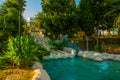 ANTALYA, TURKEY: Landscape with a view of a beautiful park with a fountain and a pond in Antalya on a sunny summer day. Royalty Free Stock Photo