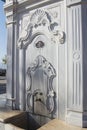 Antalya, Turkey, March 15, 2023. Stylish metal oriental Turkish Ottoman fountain for drinking water in a marble pedestal.