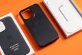 Antalya, Turkey - May 26, 2021: Newly designed Midnight Black MagSafe leather case for Apple iPhone 13 Pro on orange background