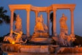 Antalya, Turkey - May, 2021: The symbol of the Alva Donna Exclusive Hotel - statues near the pool in the evening colorful lighting