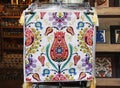 Antalya, Turkey, September 26, 2022. Decorative pillowcase on a pillow with an oriental Turkish floral pattern on the window of a