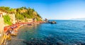 Antalya, Turkey - September 10, 2022: People on the beach near port in old town of Antalya, Turkey Royalty Free Stock Photo