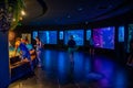 Antalya, Turkey - September 26, 2022: People enjoy the underwater view of the aquarium with longest in the world