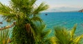 ANTALYA, TURKEY: Ship with tourists sails along the Mediterranean coast on a sunny summer day in Antalya. Royalty Free Stock Photo