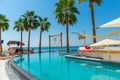 ANTALYA, TURKEY: Swimming pool and swing on the territory of Fosforlu beach on a sunny day. Royalty Free Stock Photo