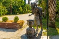 ANTALYA, TURKEY: View over traditional Turkish sculpture depicting an old man carrying a jar with tea in Antalya.