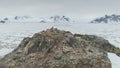 Antarctic coast gentoo penguin group aerial view