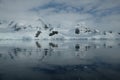 Antarctica glacial mountains reflecting in the mirror bay